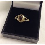 Hallmarked 9ct gold dress ring set with an oval garnet.  Size N1/2, total weight approx 1.7g.