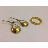 A pair of gold drop earrings and a small gold band (size E). Neither hallmarked. Earrings test as