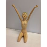 A c1920's Art Deco Pixie figurine of composite construction. 13" (33cm) tall (floor to top of arm.