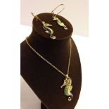 A costume jewellery enamelled seahorse pendant & earring set.