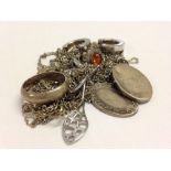 A bag of scrap silver jewellery. Approx weight 44g.