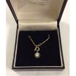 A 9ct gold pendant with CZ stone and 9ct gold box chain 14 inch. Total weight approx 3.0g.