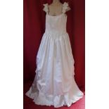 New and unused Jolie Creation satin wedding dress.  Nouveau style with beautiful satin rosebud