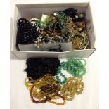 A large quantity of vintage 1940/50's and later costume jewellery with lots of glass bead examples.