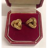 Pair of large 9ct hallmarked gold twisted knot loop earrings with rope detail.  Weight approx 4.0g.