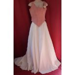 Bella Paris wedding dress in rosebud/ivory. New and unused with bodice, skirt and train with rosebud