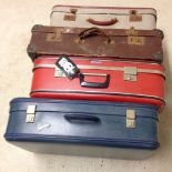 4 old suitcases