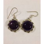 Flower design 925 silver earrings set with large cabouchon amethysts.