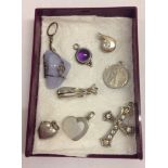 8 silver & white metal pendants/charms including a sterling silver cross set with crystals and a '