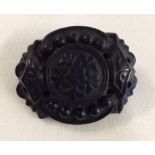 Nicely carved antique Bog Oak brooch in very good condition.  Approx 4cm across, pin in good working