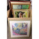 A box of paintings & prints.