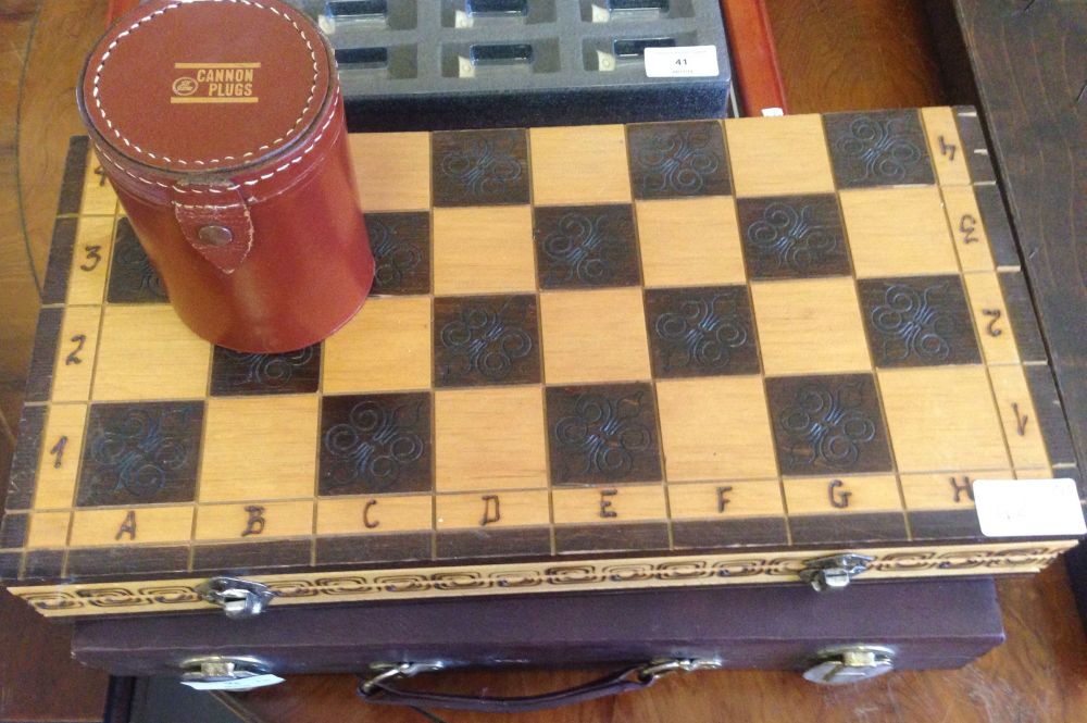 3 games comprising of boxed chess set, blackgammon boxed set and leather cased dice game.