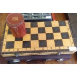 3 games comprising of boxed chess set, blackgammon boxed set and leather cased dice game.