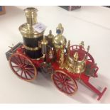 A model of the Mississippi 1869 steam driven motor car and radio in working order, Approx 25cm long