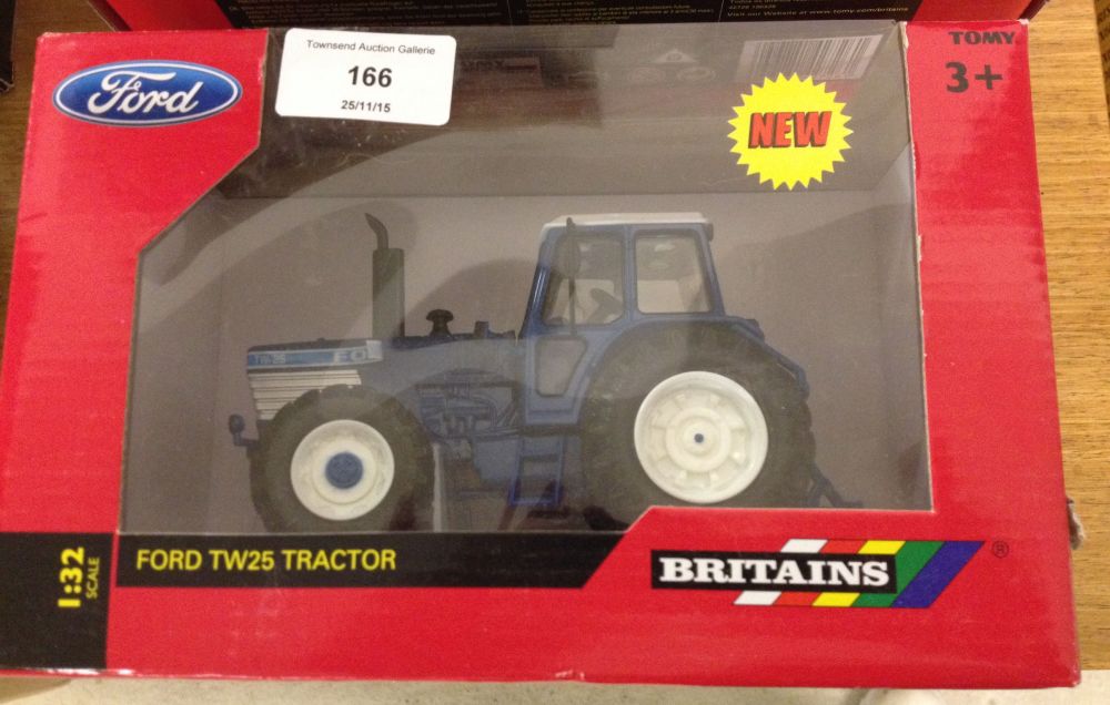 A boxed Britains 1:32 scale Ford TW25 tractor #43011.