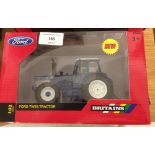 A boxed Britains 1:32 scale Ford TW25 tractor #43011.