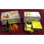 2 boxed Dinky models: 401 Forklift Truck and 962 Muir Hill Drumper Truck.