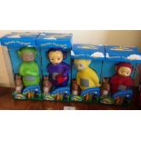 A set of 4 Teletubbies squeaky vinyl figures with rabbits.