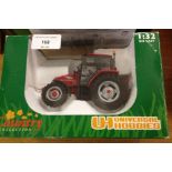 A boxed Universal Hobbies 1:32 scale McCormick CX105 tractor #2389.