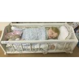A Danbury mint doll 'Sweet Dreams' complete in white wooden cradle. In original box with