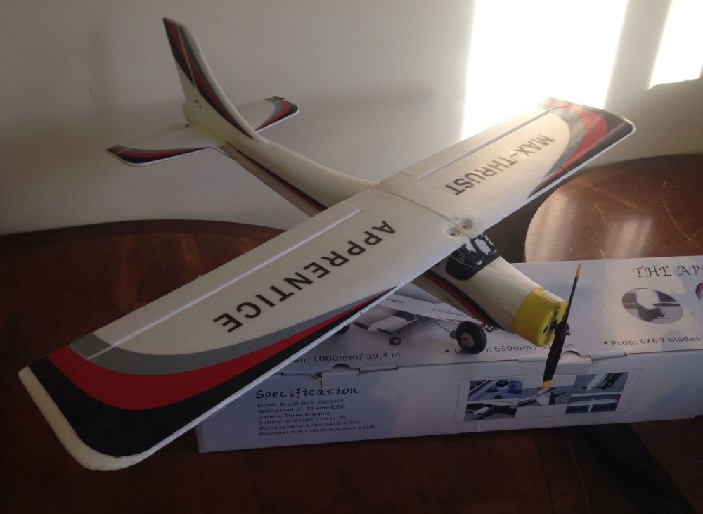 A Max Thrust Apprentice radio controlled aeroplane of polystyrene construction with box, controller,