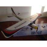 A Max Thrust Apprentice radio controlled aeroplane of polystyrene construction with box, controller,