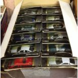 A trade box of 36 1:60 scale Teamsters diecast cars.