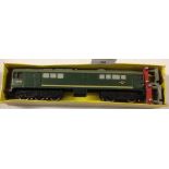 A Hornby Dublo D5702 locomotive in British Rail Green and 2 Dublo buffers.