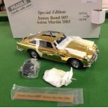 A boxed Danbury Mint Special Edition James Bond 007 gold plated Aston martin DB5 in unused