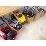 A large quantity (7 boxes) of playworn radio controlled cars & controllers - not tested.