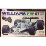 A boxed unmade Tamiya 1:20 scale Williams FW07 Formula One Grand Prix car plastic kit.