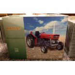 A boxed Universal Hobbies 1:16 scale Massey Ferguson 135 tractor