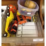 A box of playworn diecast & boxed Needadriver promotional lorries. Together with a Tonka low