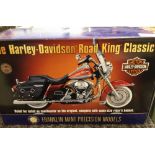 A boxed Franklin Mint 1:10 scale Harley-Davidson Road King classic motor cycle. No riders helmet