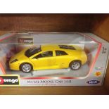 A boxed Bburago 1:18 scale yellow Lamborghini Murcielago - mint in box.