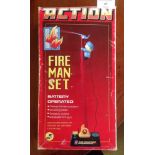 A boxed battery operated Action Fire Man set.
