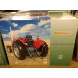 A boxed Universal Hobbies 1:16 scale Massey Ferguson 135 tractor #UH2698U.