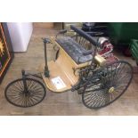 A large scale model of an early power driven trike/car. Approx 30cm long