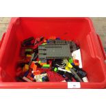 A box of Lego style bricks.