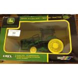 A boxed 1:32 scale John Deere 8430T tracked tractor compatable with ERTL and Britains implements.