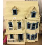 Large dolls house, town house style. Completely furnished.