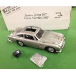 A boxed Danbury Mint James Bond 007 silver Aston Martin DB5 in unused condition. 1:24 scale. No