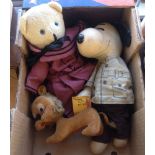 A soft toy Snoopy together with a vintage soft toy lion and a dressed teddy bear.