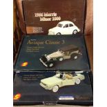 3 trade boxes of 1:26 scale diecast cars: 1) 1956 Morris Minor 1000. 2) 1965 Ford Mustang and 3)