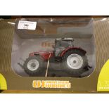 A boxed Universal Hobbies 1:32 scale Massey Ferguson 7499 tractor #UH2850.