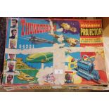 A c1960s Chad Valley Thunderbirds Give-a-Show projector & slides.