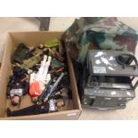 A box of Action Man toys to include 4 Action Men, Army truck, clothes and accessories