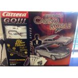 A Carrera James Bond 007 Casino Royale Scalextric type slot car set with 2 Aston Martin cars.