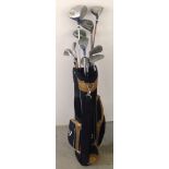 A set of youth sized golf clubs and carrying bag.