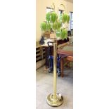 Gold coloured standard lamp with 5 green glass shades.